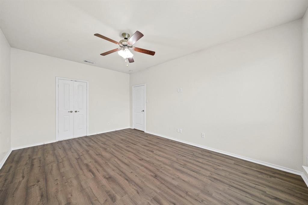 1205 Crest Ridge Drive Glenn Heights, TX 75154 - Photo 12 of 26 a view of empty room with wooden floor