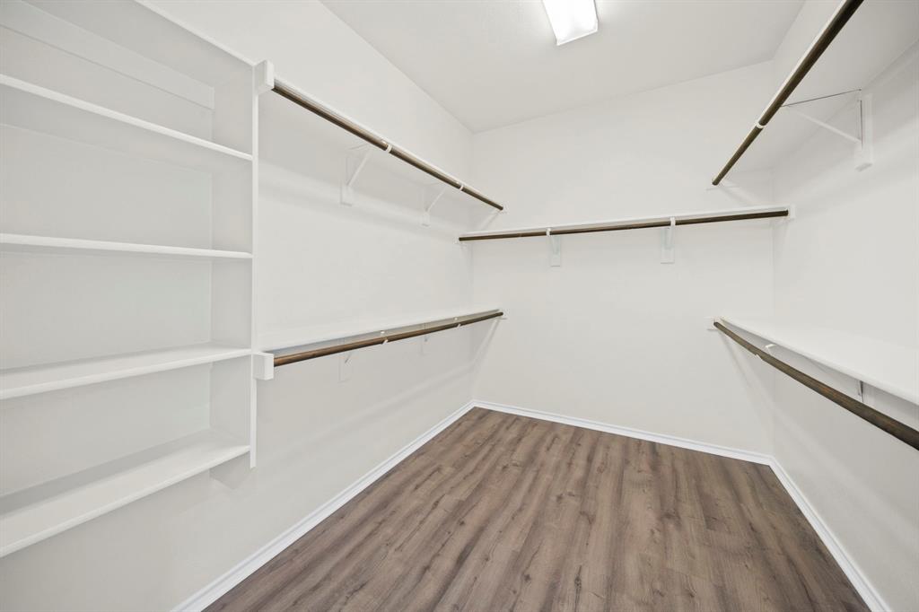 1205 Crest Ridge Drive Glenn Heights, TX 75154 - Photo 15 of 26 a view of a room with wooden floor