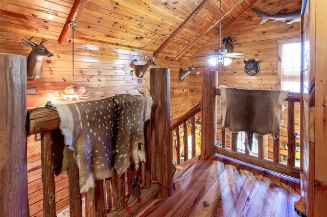 a view of a porch with wooden floor