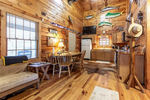 a room with furniture and wooden floor