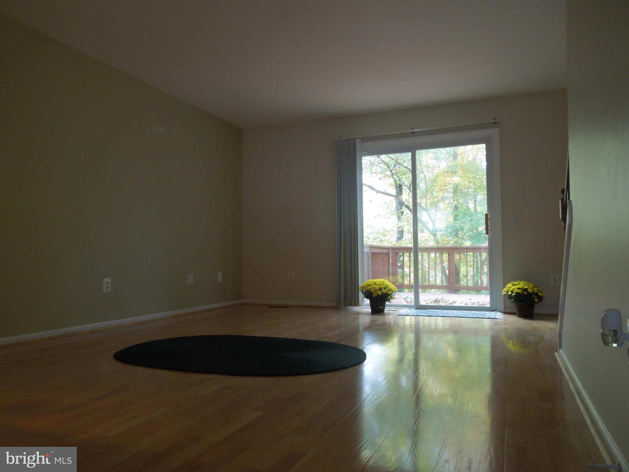 14853 Basingstoke Loop Centreville, VA 20120 - Photo 12 of 30 a view of empty room with wooden floor