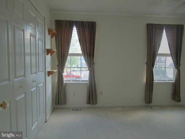 14853 Basingstoke Loop Centreville, VA 20120 - Photo 16 of 30 an empty room with windows
