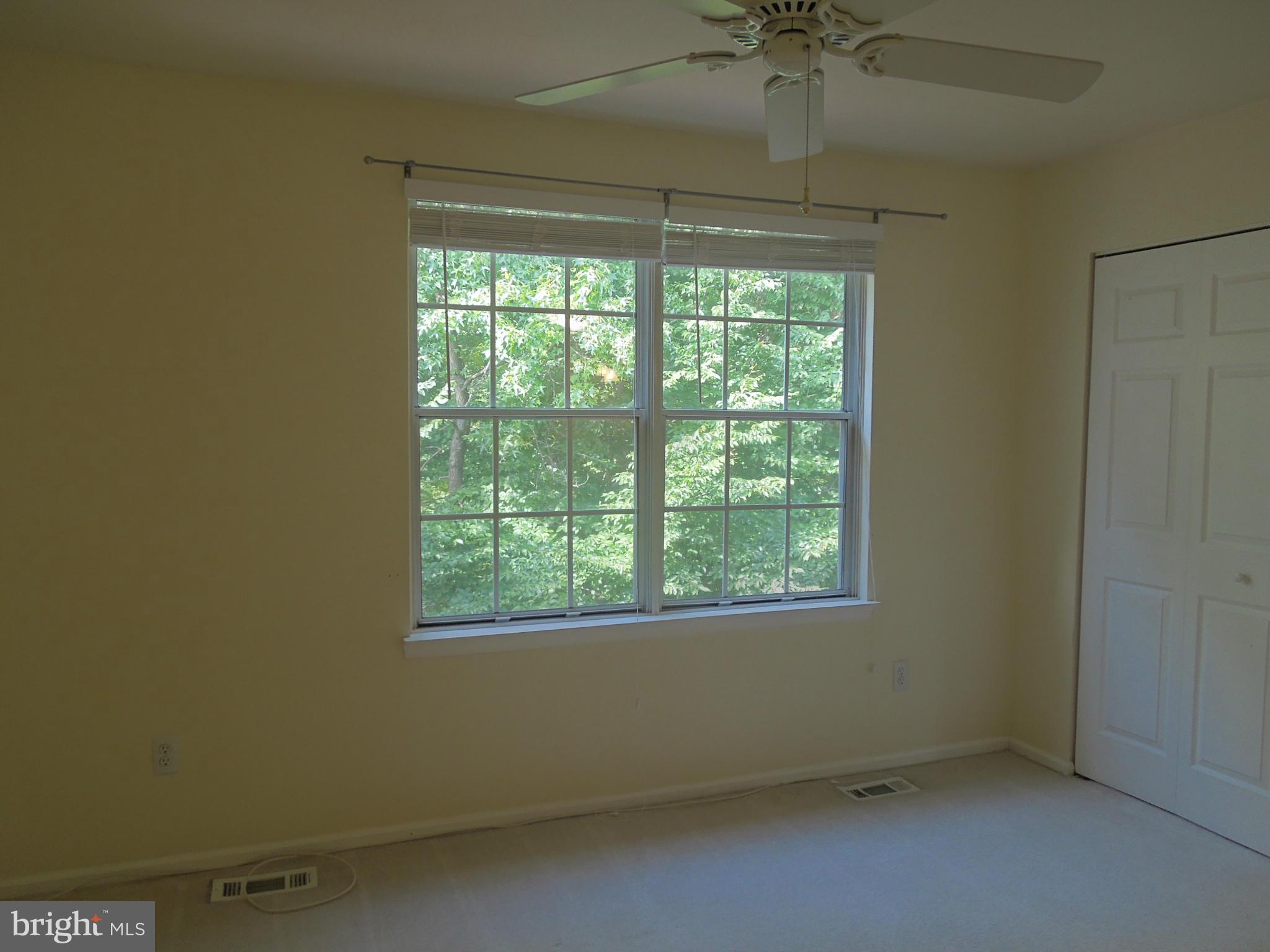 14853 Basingstoke Loop Centreville, VA 20120 - Photo 18 of 30 an empty room with a window