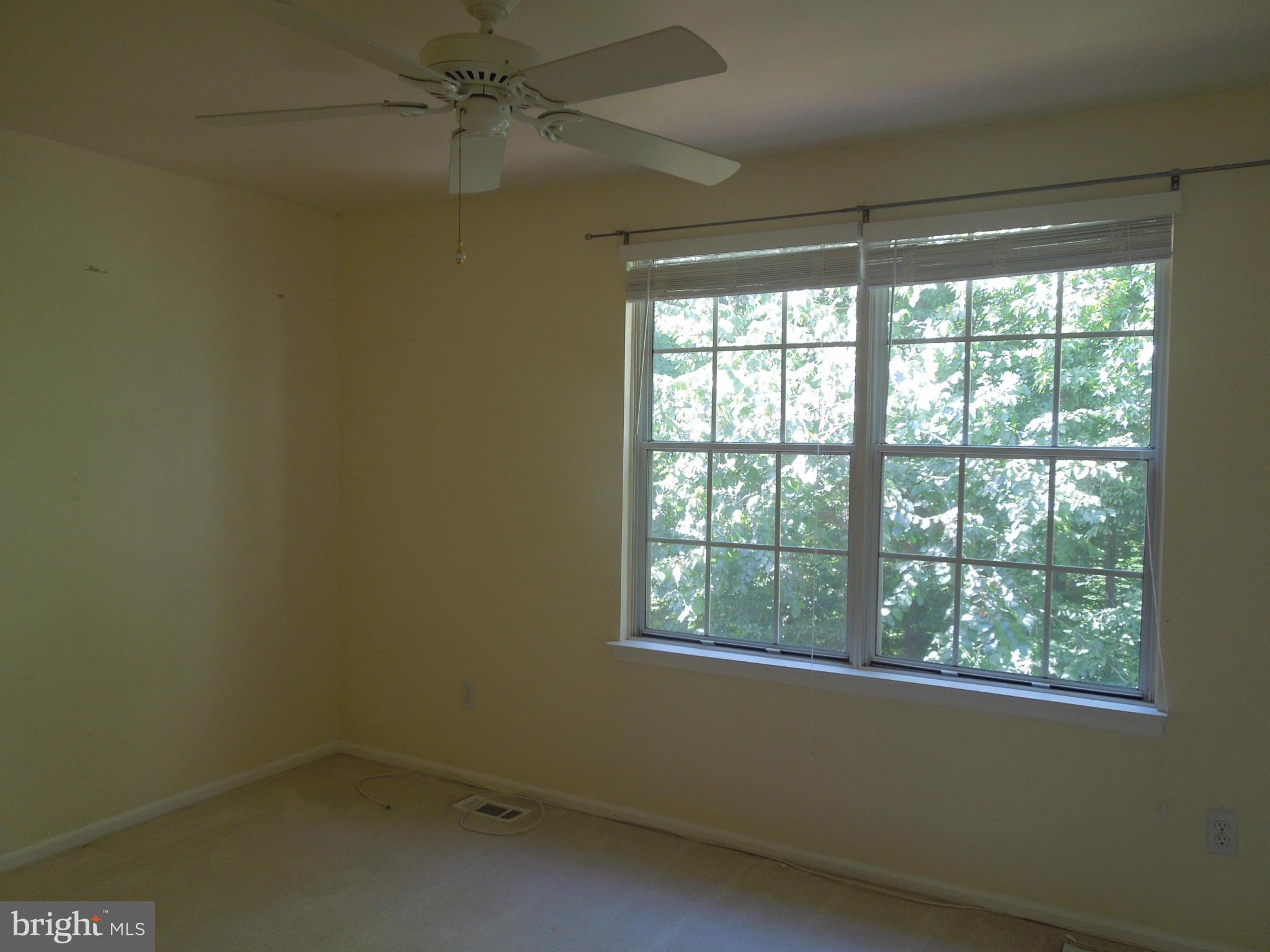 14853 Basingstoke Loop Centreville, VA 20120 - Photo 20 of 30 an empty room with a window
