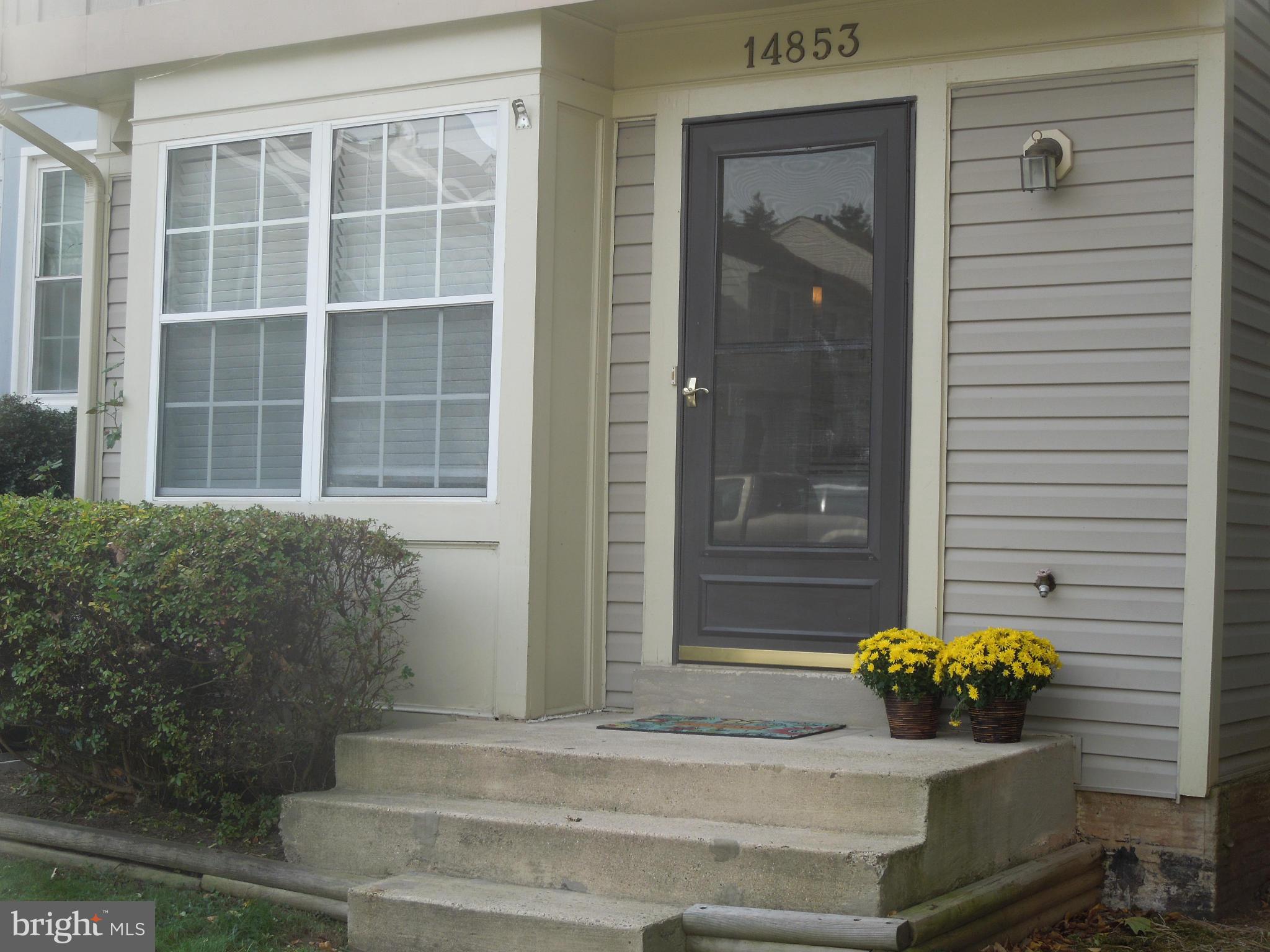 14853 Basingstoke Loop Centreville, VA 20120 - Photo 30 of 30 a front view of a house