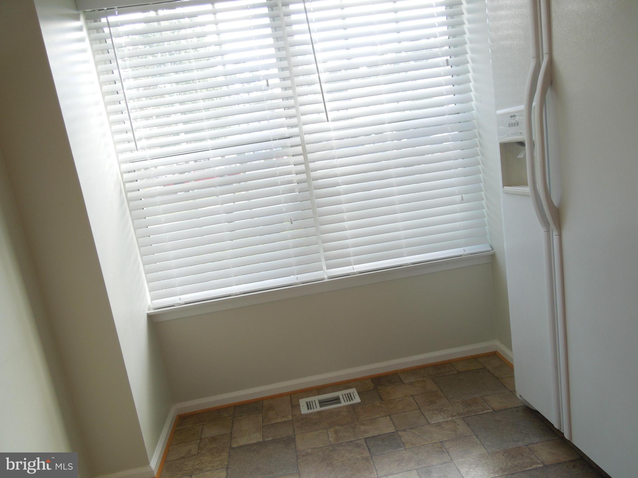 14853 Basingstoke Loop Centreville, VA 20120 - Photo 9 of 30 a view of a small space with a window