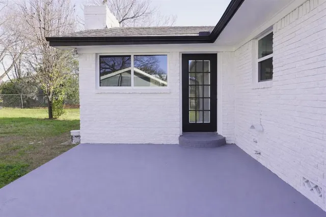 a backyard of a house with lots of green space