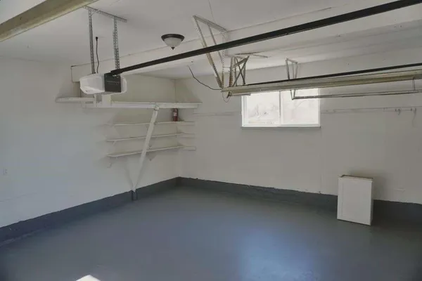 a view of a room with racks on the wall