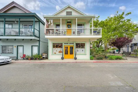 a house with trees in front of it