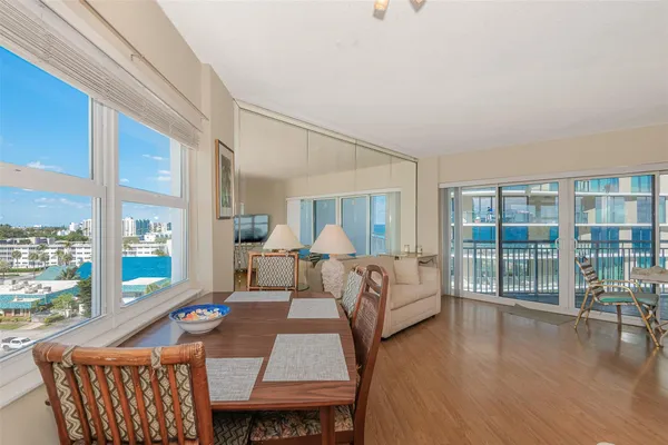 a view of a patio with a table and chairs