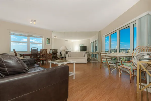 a living room with furniture and a table