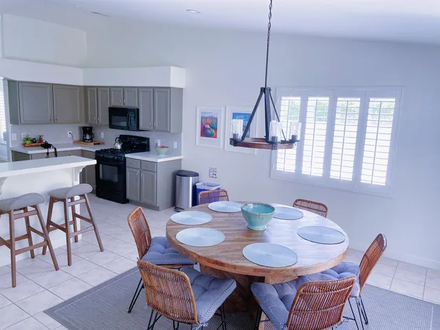 a view of a dining room with furniture
