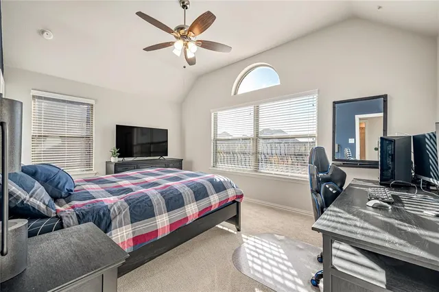 a bed room with a bed and a couch