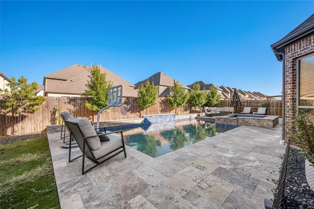 a view of houses with outdoor space and seating