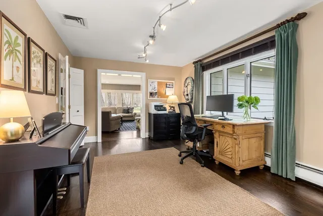 a living room with furniture and a table