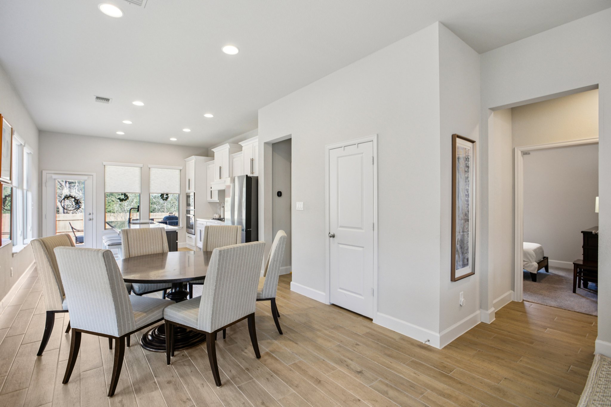 149 Plumbago Loop Bastrop, TX 78602 - Photo 14 of 33 Dining room with light wood-type flooring and recessed lighting