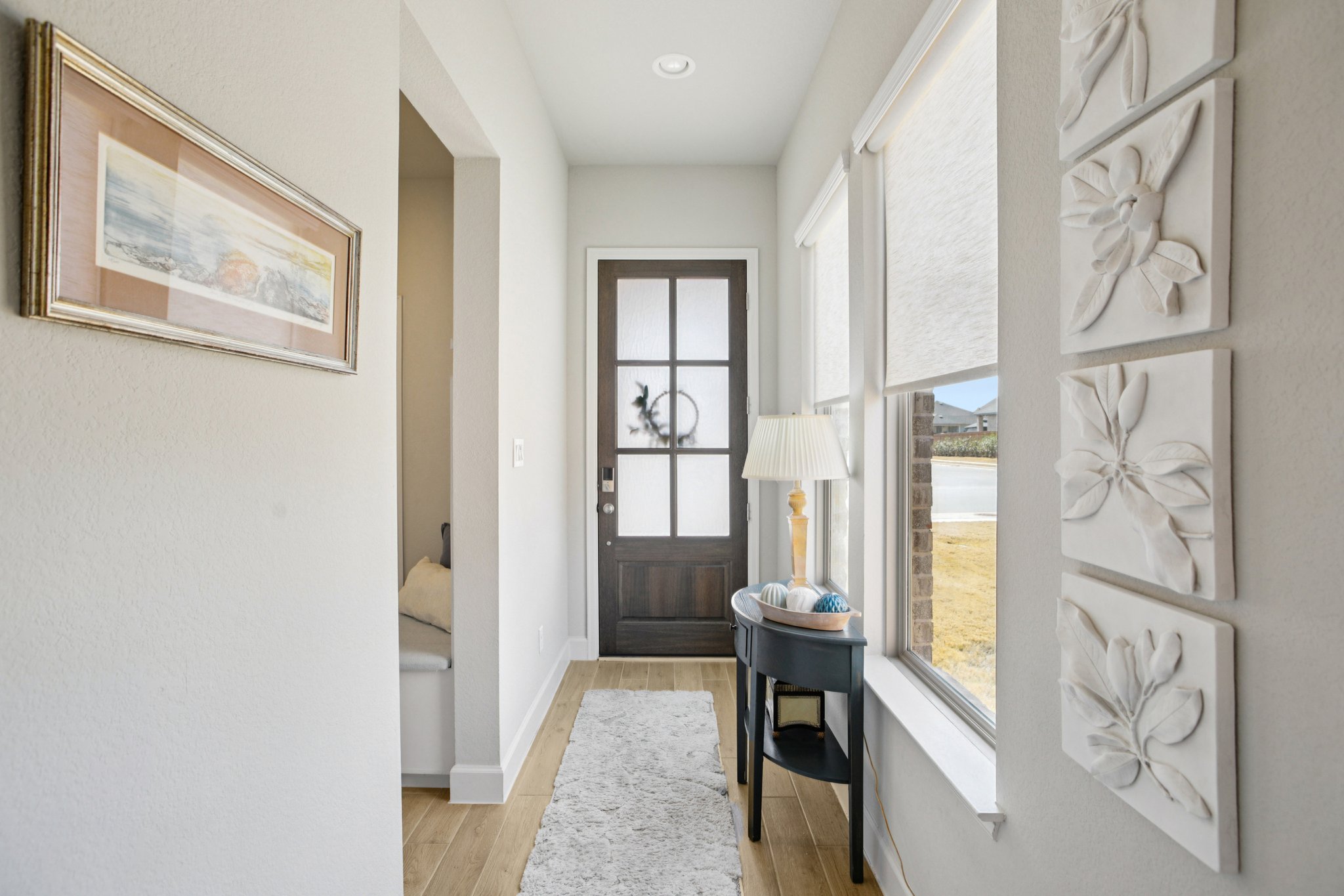 149 Plumbago Loop Bastrop, TX 78602 - Photo 2 of 33 Entryway with wood finished floors and recessed lighting