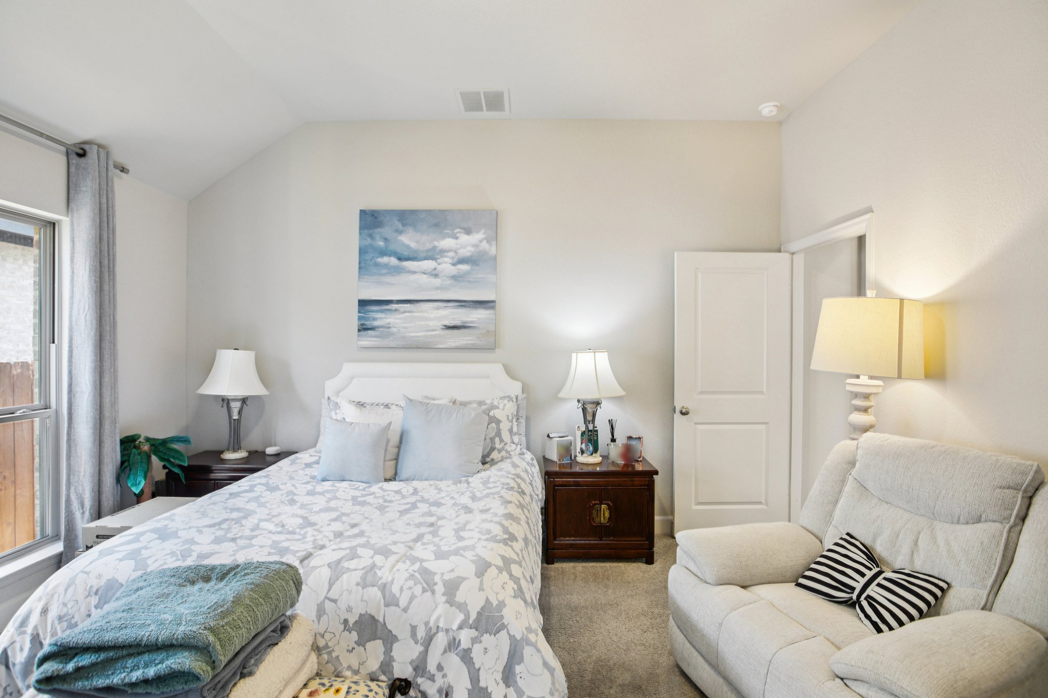 149 Plumbago Loop Bastrop, TX 78602 - Photo 26 of 33 Bedroom with carpet flooring and lofted ceiling