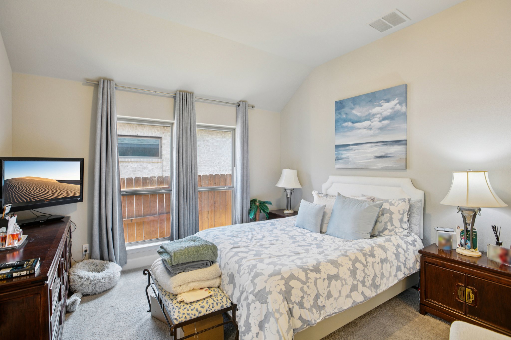 149 Plumbago Loop Bastrop, TX 78602 - Photo 27 of 33 Bedroom featuring carpet flooring and vaulted ceiling