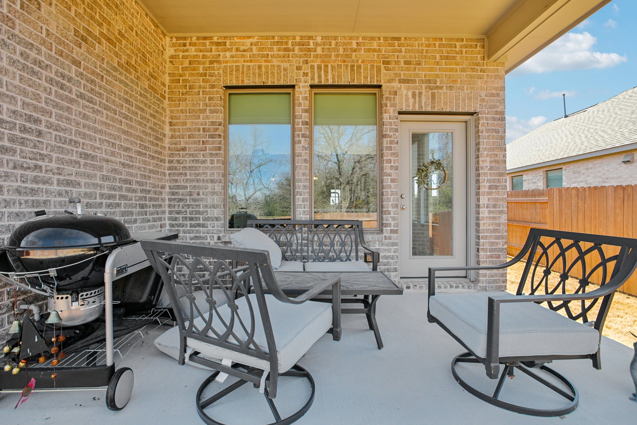 149 Plumbago Loop Bastrop, TX 78602 - Photo 6 of 33 View of patio / terrace featuring an outdoor lounge area and a grill