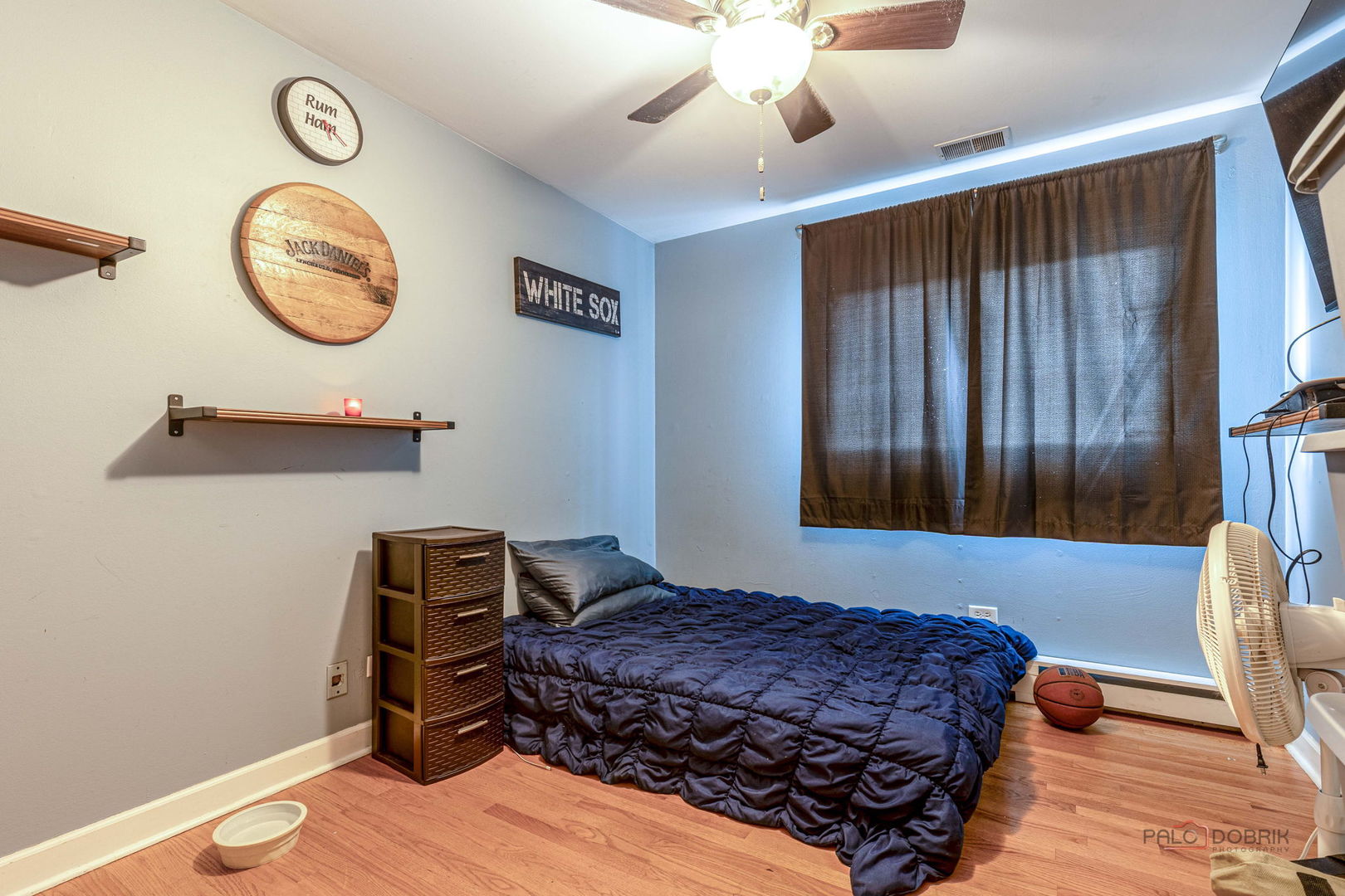 571 Nash Road Crystal Lake, IL 60014 - Photo 16 of 29 a bedroom with a bed and a chandelier