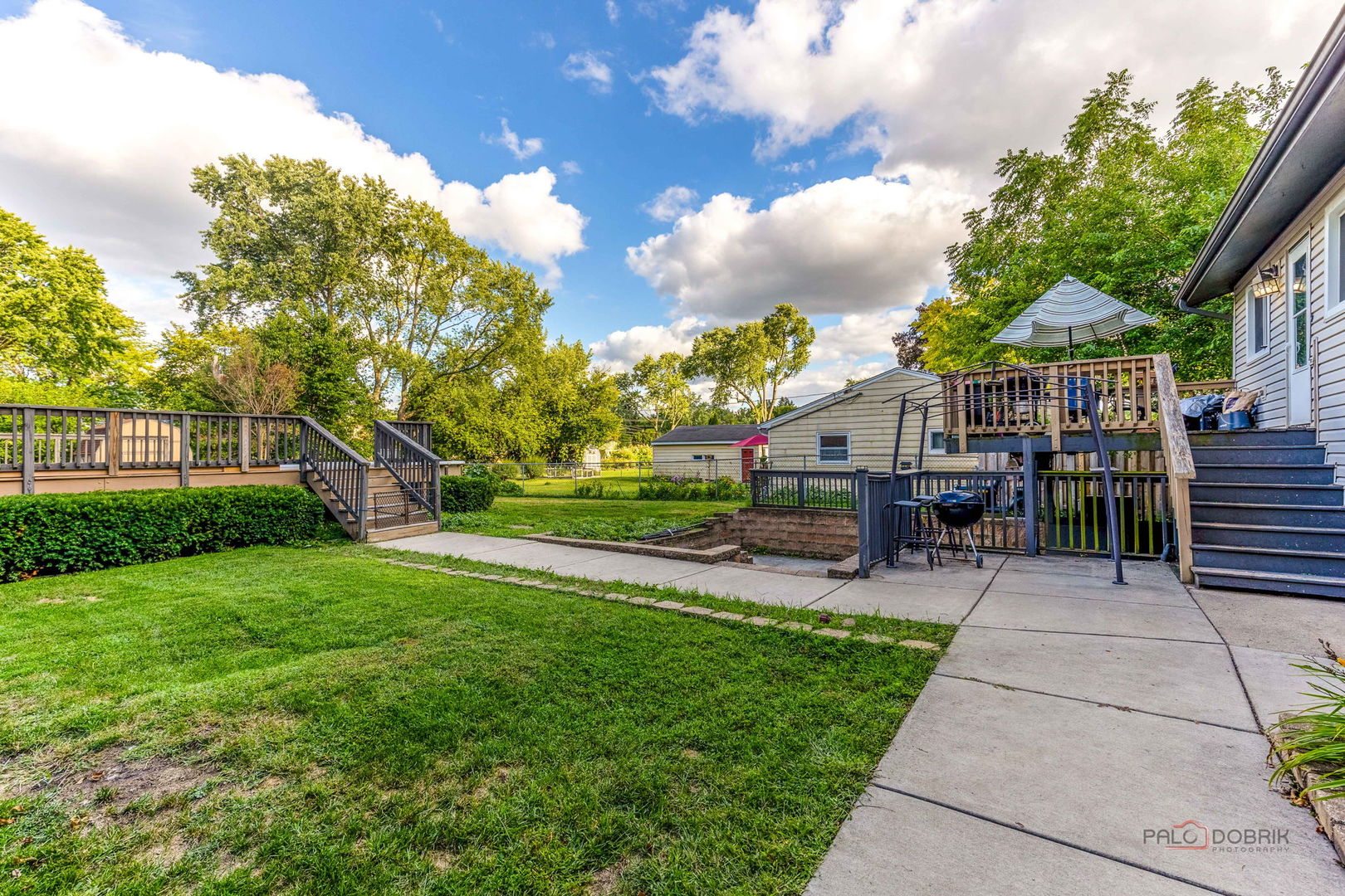 571 Nash Road Crystal Lake, IL 60014 - Photo 25 of 29 a view of house with outdoor seating and green space