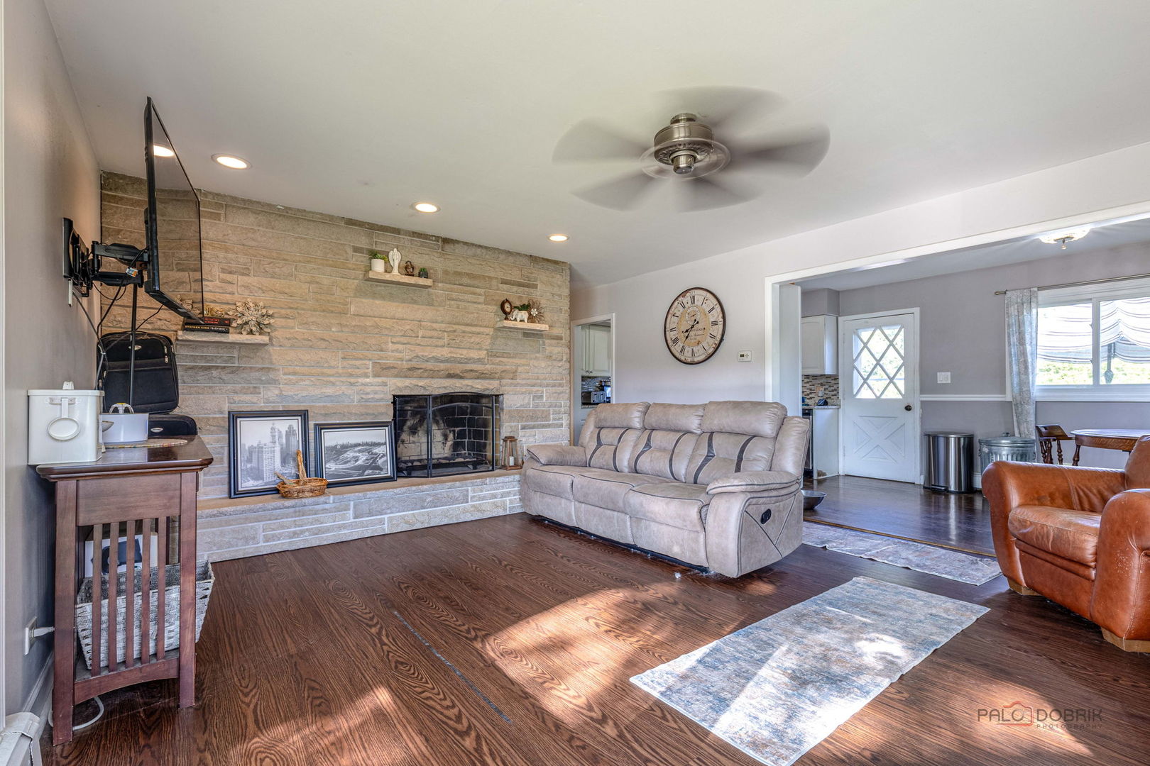 571 Nash Road Crystal Lake, IL 60014 - Photo 9 of 29 a living room with furniture and a fireplace