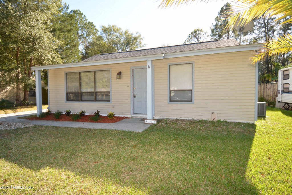 3156 Ricky Drive Jacksonville, FL 32223 - Photo 1 of 9 a view of a house with backyard and garden