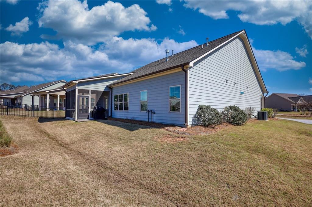 612 Haven Way Monroe, GA 30655 - Photo 2 of 44 a front view of a house with a yard