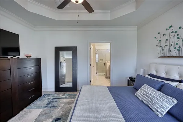 a bedroom with a bed and furniture