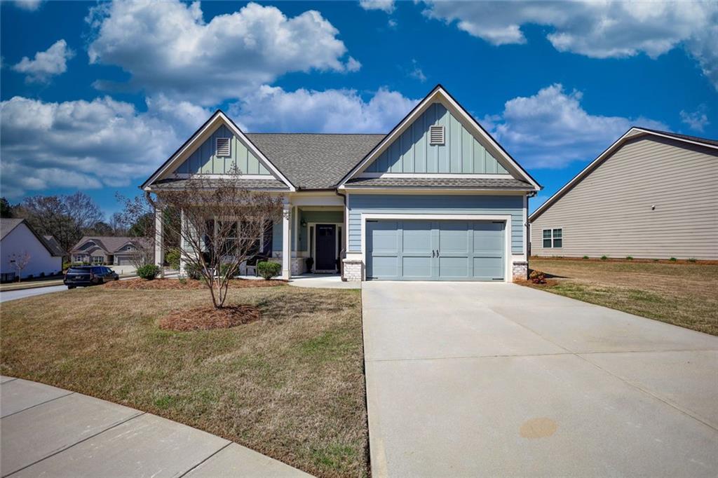 612 Haven Way Monroe, GA 30655 - Photo 3 of 44 a front view of a house with garden