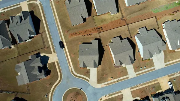 a view of a garden with a building