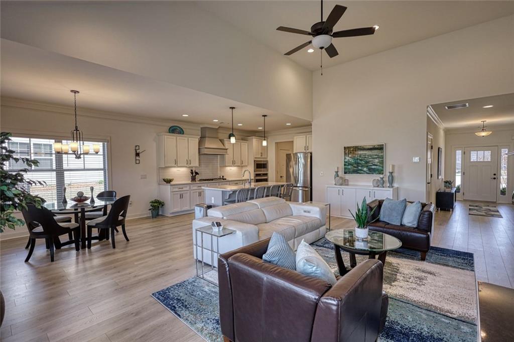 612 Haven Way Monroe, GA 30655 - Photo 5 of 44 a living room with furniture and a wooden floor
