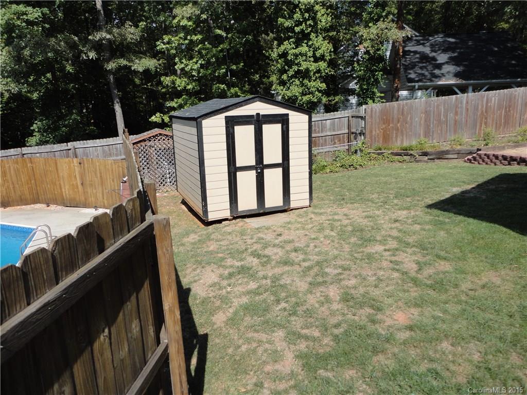 952 Pleasant Ridge Road, Unit 31 Fort Mill, SC 29715 - Photo 23 of 23 a backyard of a house with lots of green space