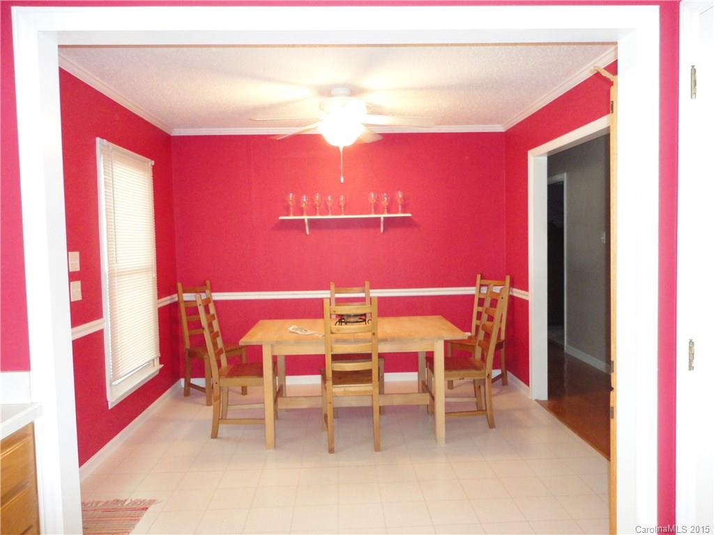 952 Pleasant Ridge Road, Unit 31 Fort Mill, SC 29715 - Photo 6 of 23 a dining room with furniture and wooden floor