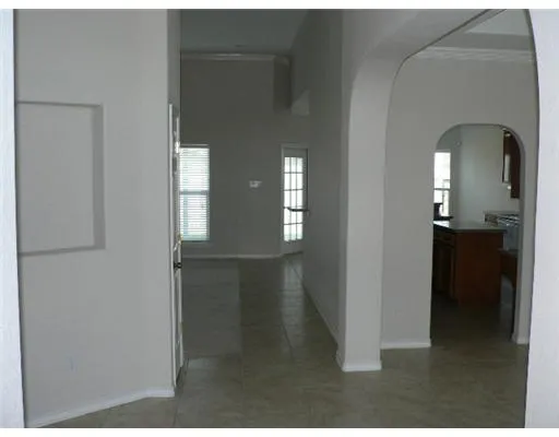 a view of hallway with livingroom