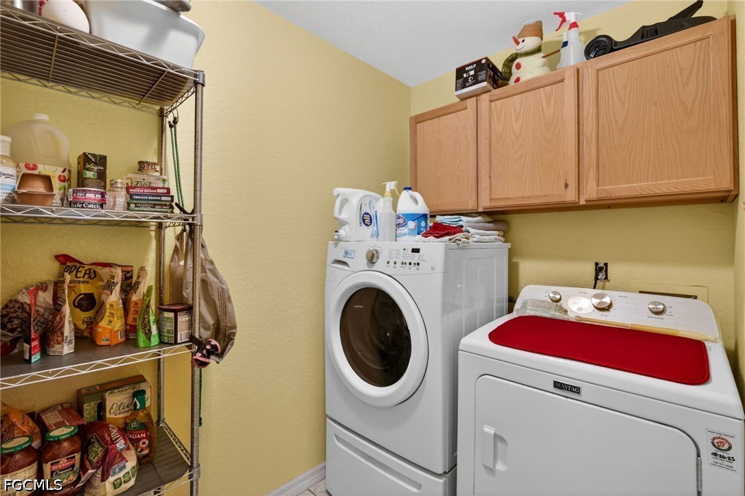 5520 Phillips Street Bokeelia, FL 33922 - Photo 20 of 50 a utility room with sink dryer and washer