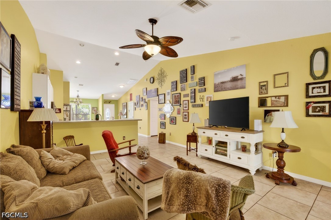 5520 Phillips Street Bokeelia, FL 33922 - Photo 10 of 50 a living room with furniture and a flat screen tv