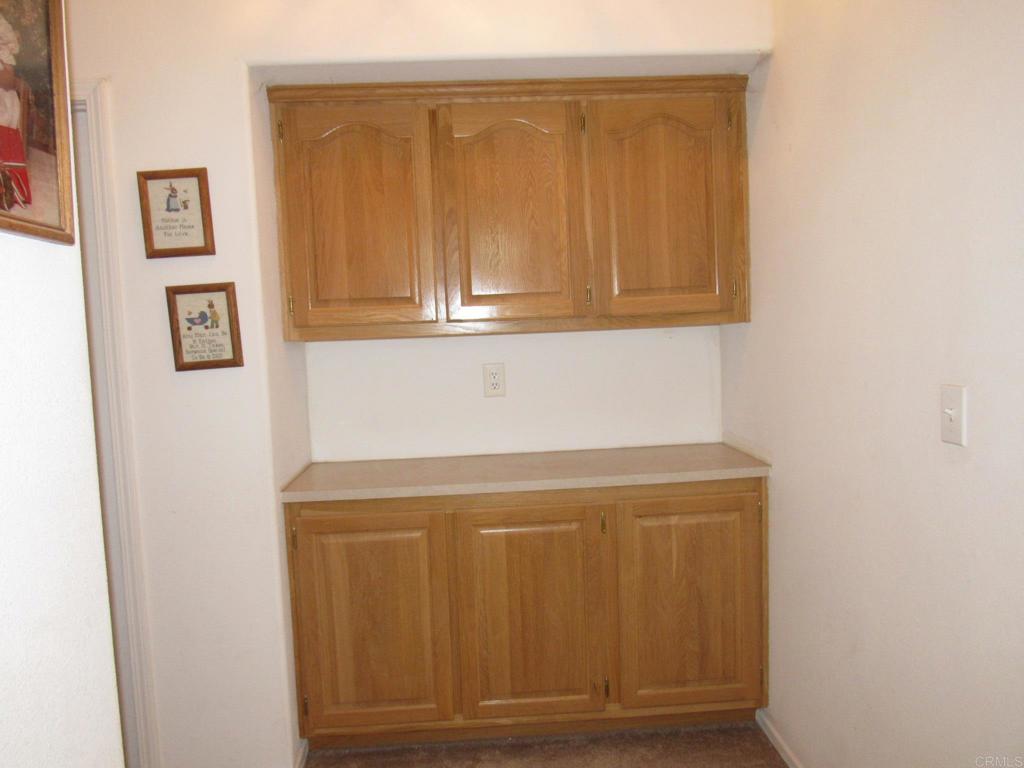 1124 Far Valley Road Campo, CA 91906 - Photo 13 of 21 a close view of wooden cabinets