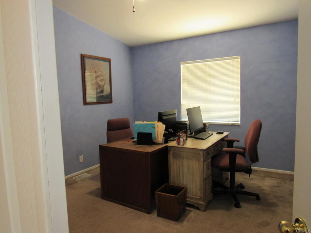 1124 Far Valley Road Campo, CA 91906 - Photo 14 of 21 a view of a workspace with furniture
