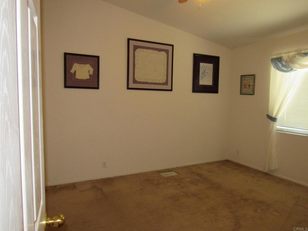 1124 Far Valley Road Campo, CA 91906 - Photo 10 of 21 a view of an empty room with windows