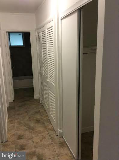 7527 Greenleaf Road Landover, MD 20785 - Photo 12 of 15 a view of a bathroom with a glass door