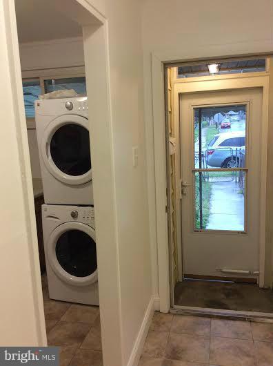 7527 Greenleaf Road Landover, MD 20785 - Photo 3 of 15 a view of a hallway with washer and dryer