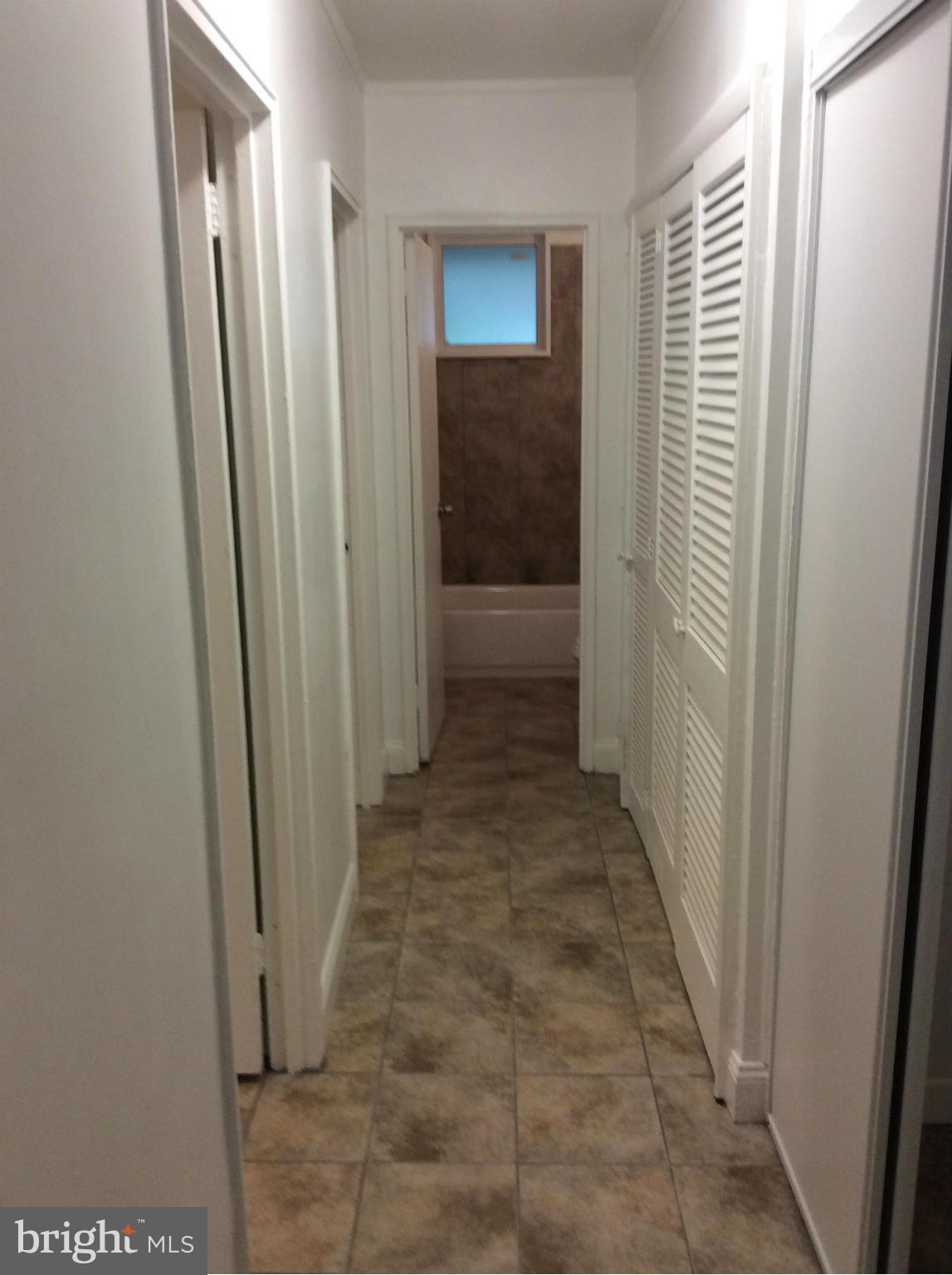 7527 Greenleaf Road Landover, MD 20785 - Photo 9 of 15 a view of hallway with shower
