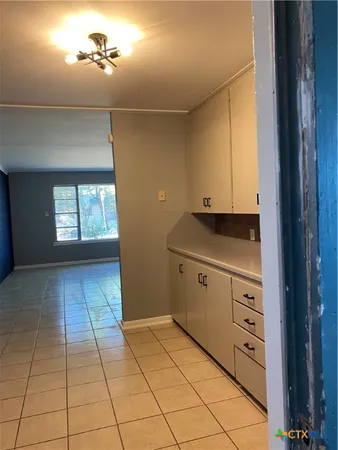 a kitchen with a stove