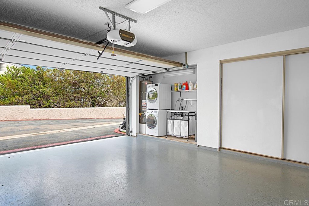 2372 Altisma Way, Unit C Carlsbad, CA 92009 - Photo 28 of 30 a view of a hardwood and an empty room