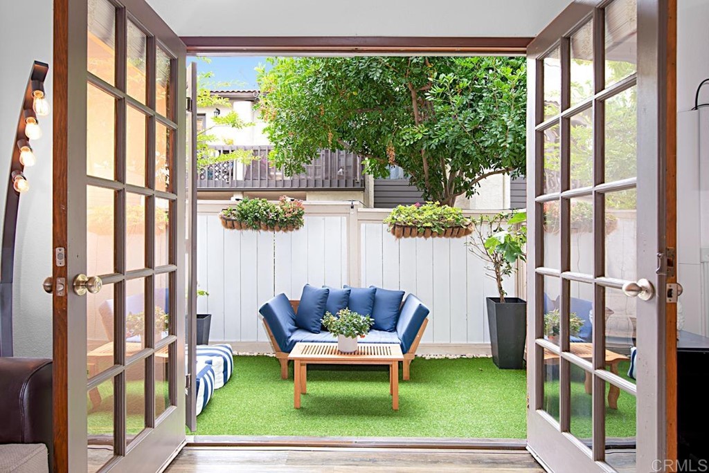 2372 Altisma Way, Unit C Carlsbad, CA 92009 - Photo 6 of 30 a house view with outdoor seating space