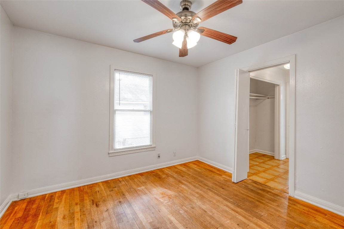 611 Genard Street Austin, TX 78751 - Photo 13 of 26 a view of empty room with wooden floor
