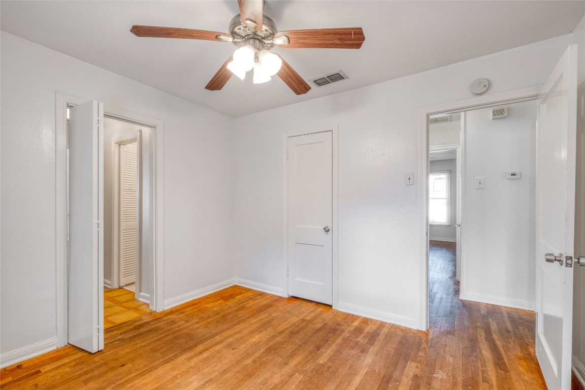 611 Genard Street Austin, TX 78751 - Photo 14 of 26 a view of empty room with wooden floor