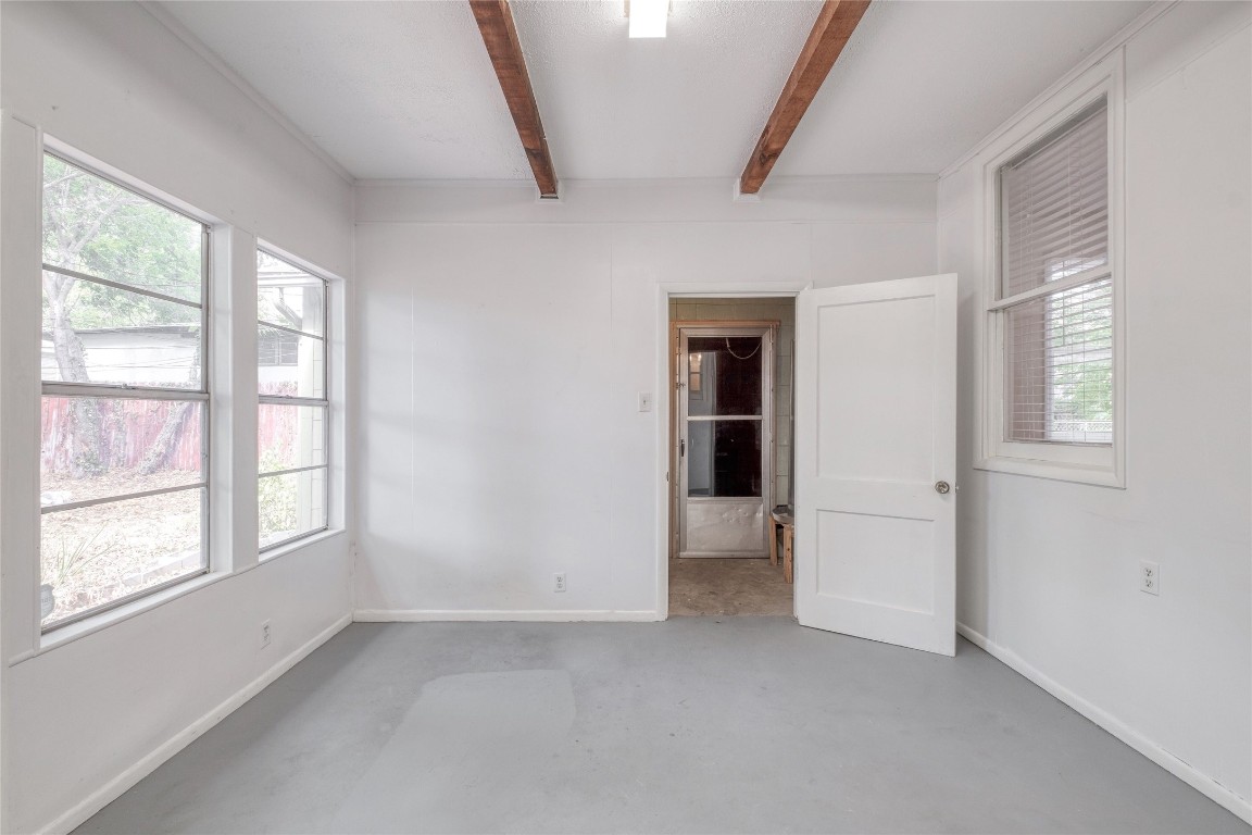 611 Genard Street Austin, TX 78751 - Photo 20 of 26 an empty room with windows and closet